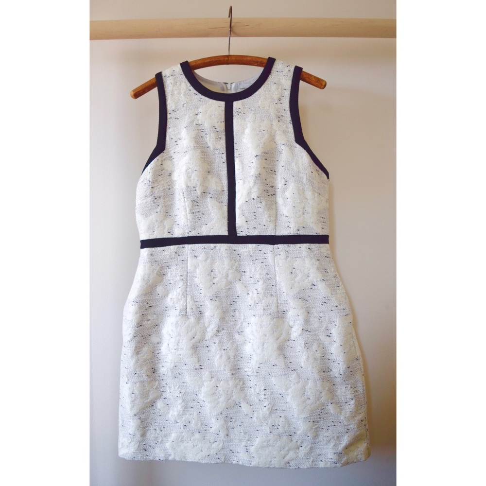 Shift dress with intricate textile and roses